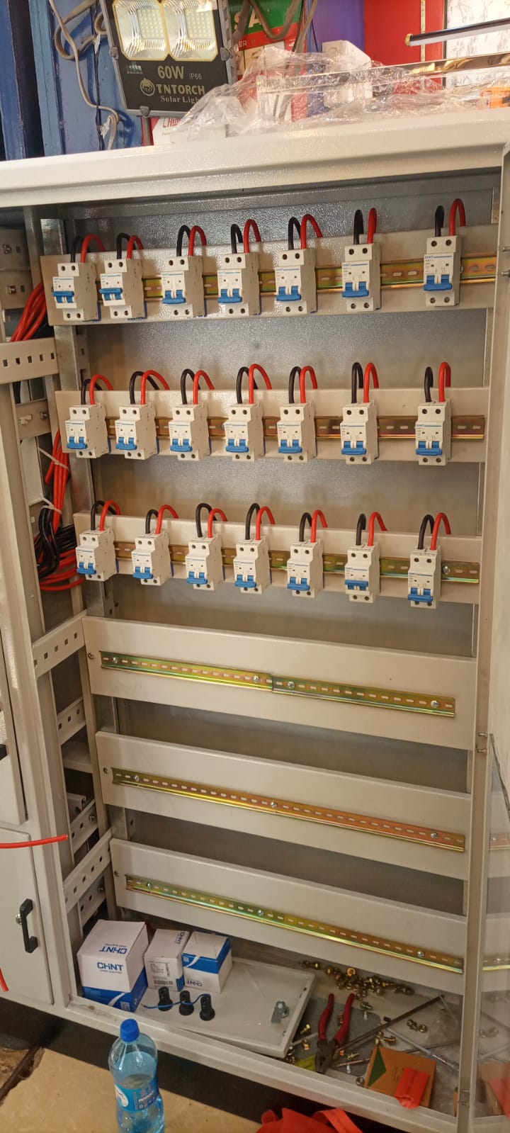 Electrical cabinet containing multiple parts.